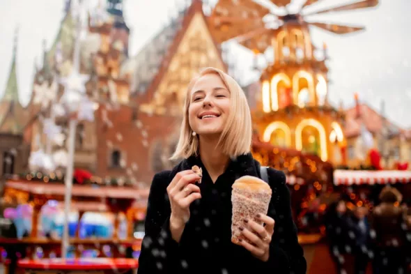 beautiful blonde with spit cake christmas market wroclaw poland