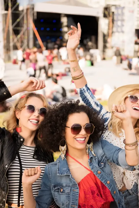 Beautiful young women having fun together at a festival in Poland