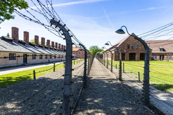 Electric fence at the Auschwitz-Birkenau Memorial and Museum, preserving the history of the Holocaust near Kraków