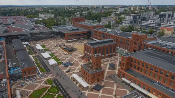 Aerial view of Manufaktura, one of Łódź’s most iconic landmarks, surrounded by the city’s urban landscape