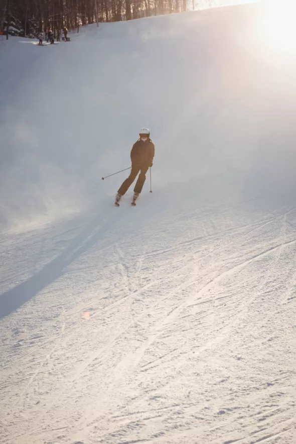 Skier skiing mountain slope