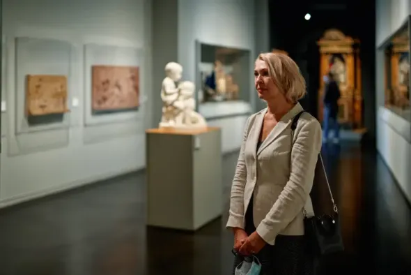 Women viewing historical exhibitions at the Warsaw Uprising Museum in Warsaw