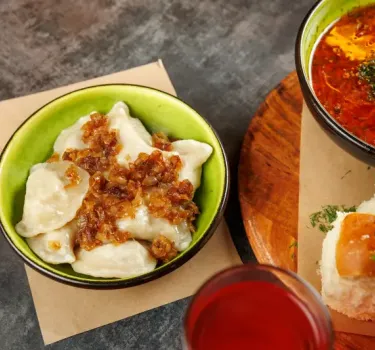 Try some Polish specialities, such as Ukrainian-style pierogi with onions