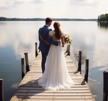 Bride and groom at Morskie Oko lake in the Tatra Mountains, Poland