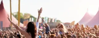 Crowds enjoying themselves outdoor music festival in Poland
