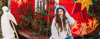 A beautiful girl enjoying the charm of the Christmas Market in Krakow