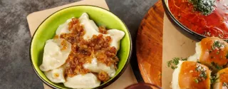 Try some Polish specialities, such as Ukrainian-style pierogi with onions