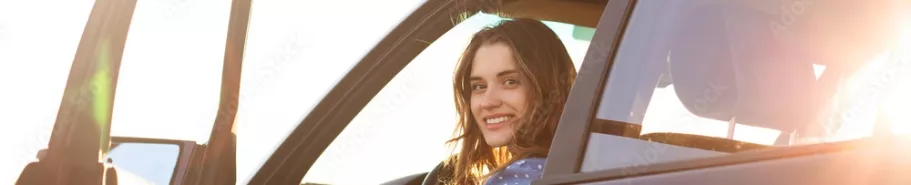 Girl in a rented car
